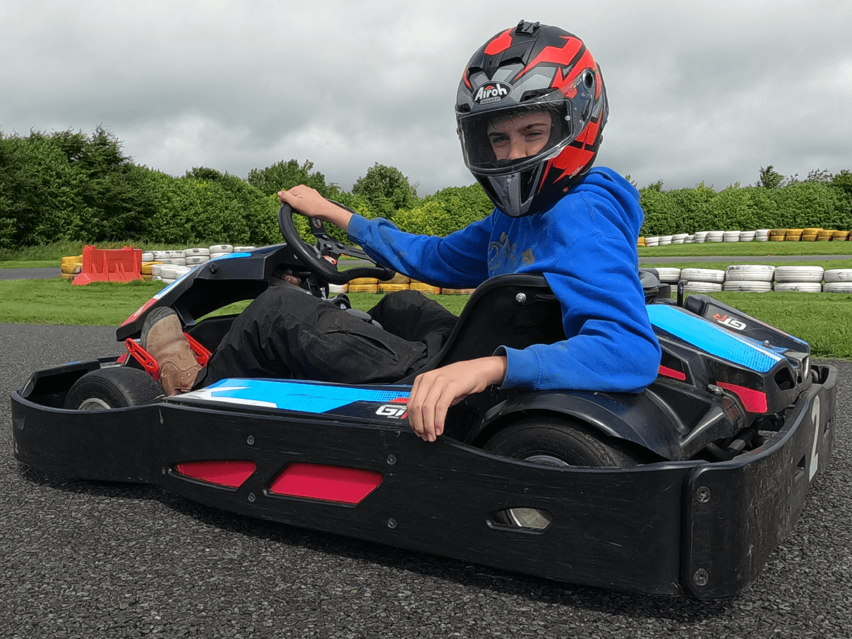 Racer at Athboy Karting extending an invitation for a thrilling Grand Prix