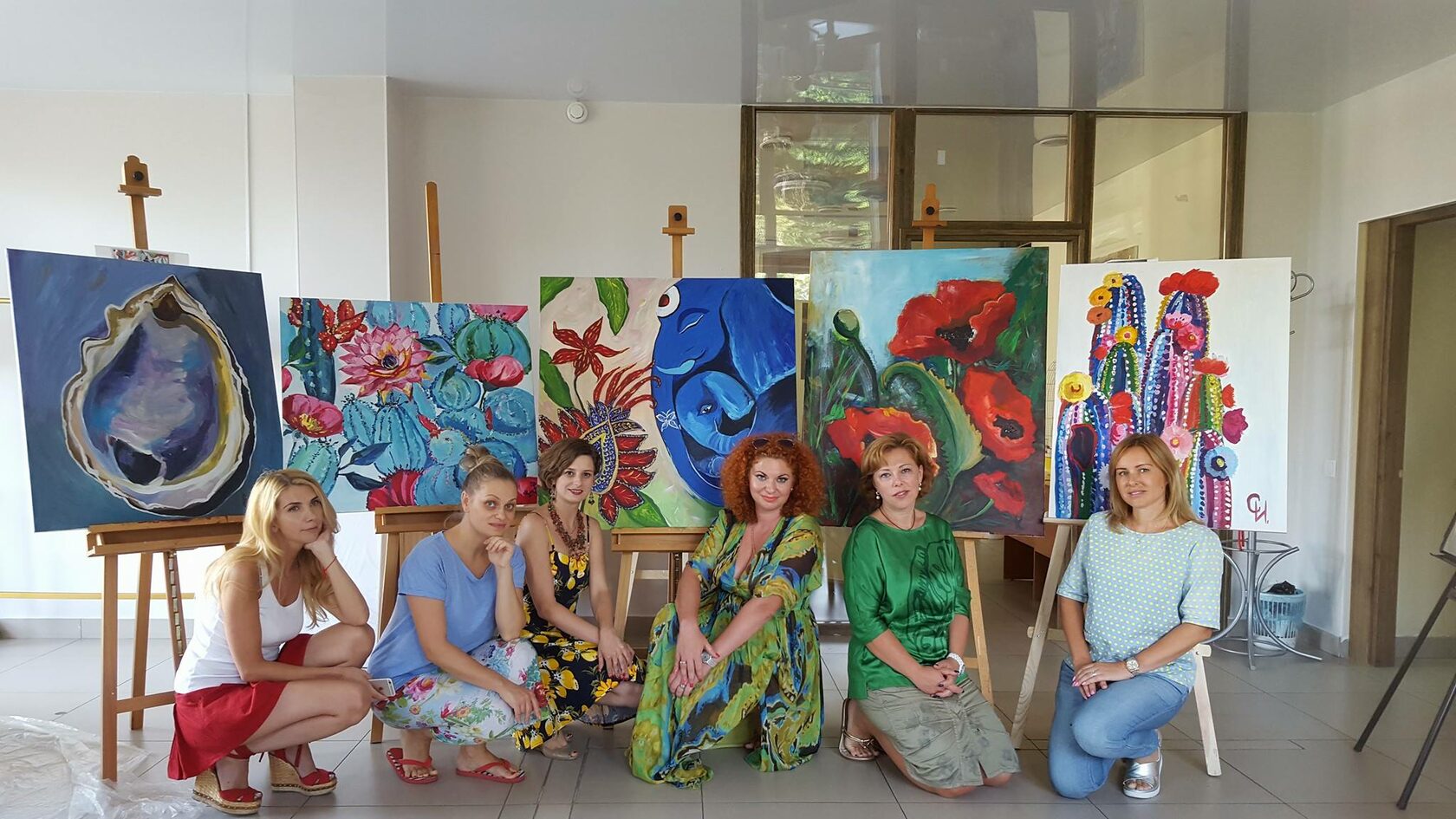 Students with paintings