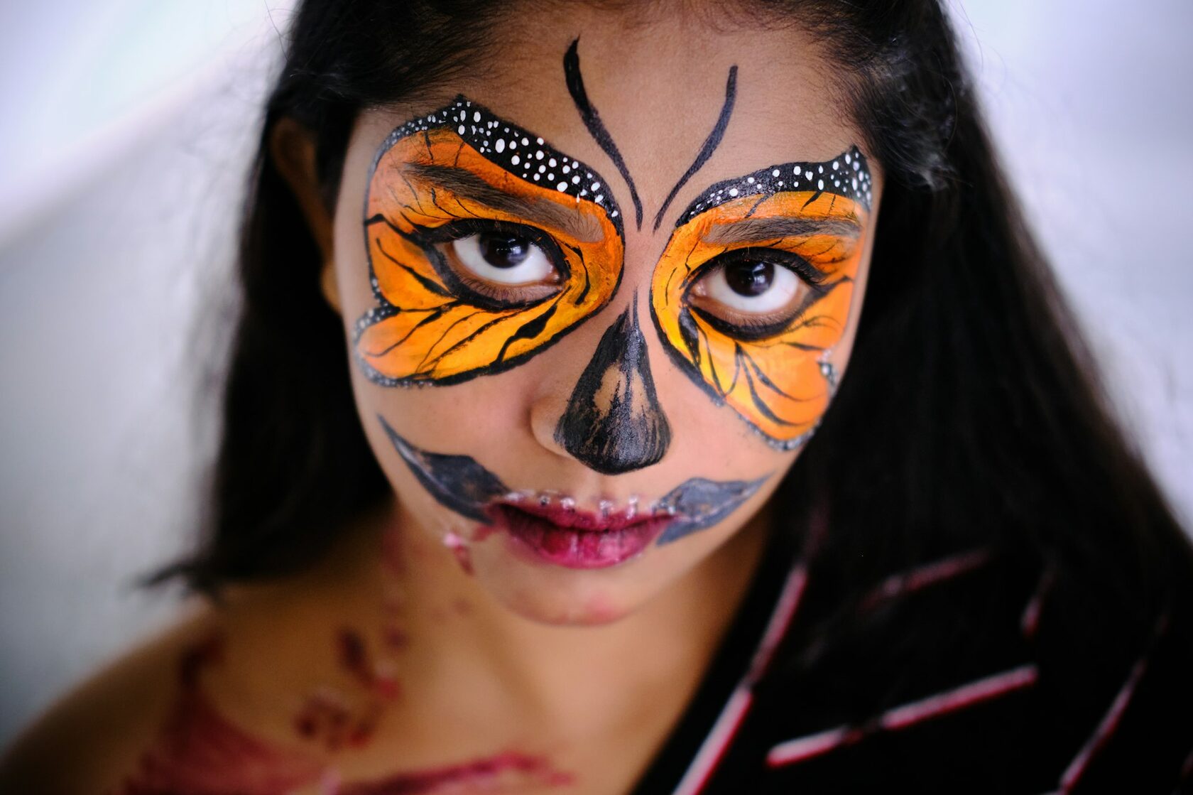 Creative face painting butterfly design