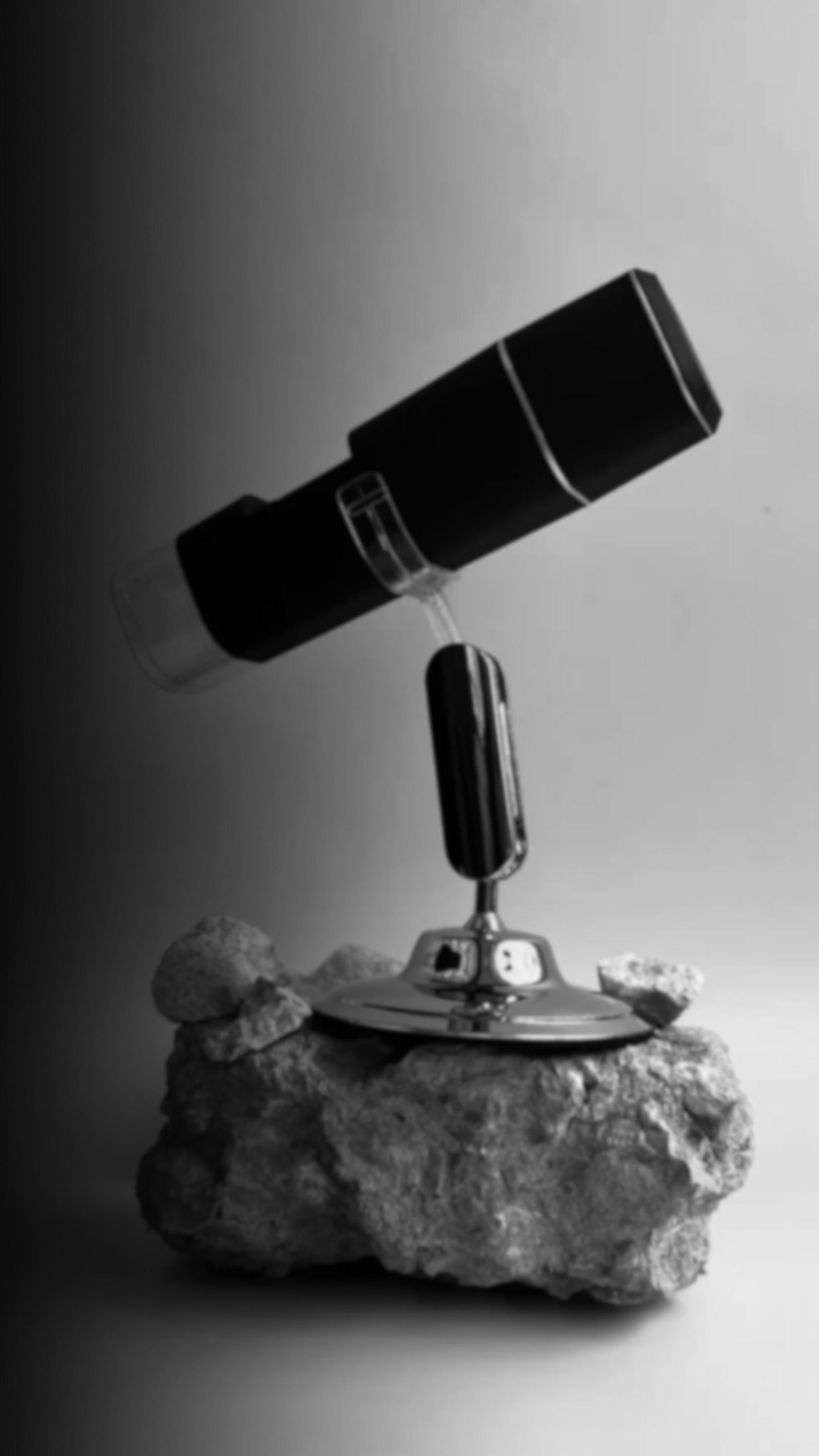 трихоскоп кожи головы стоит на камне