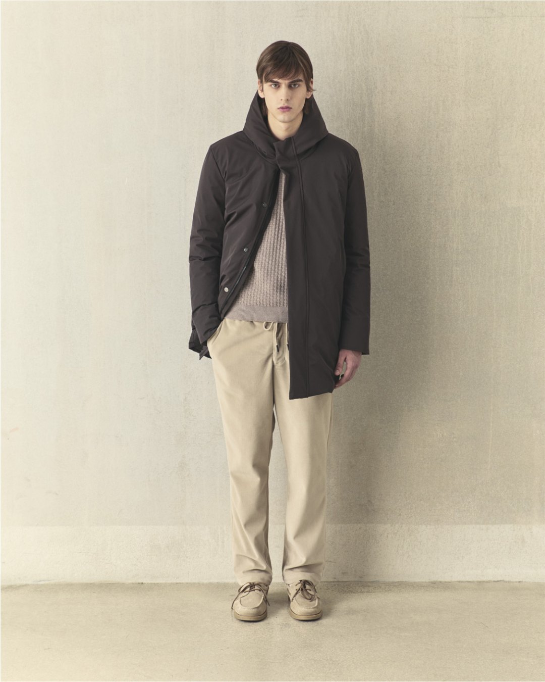 SH ZERO Autumn-Winter 2026-27: dark technical parka and light trousers