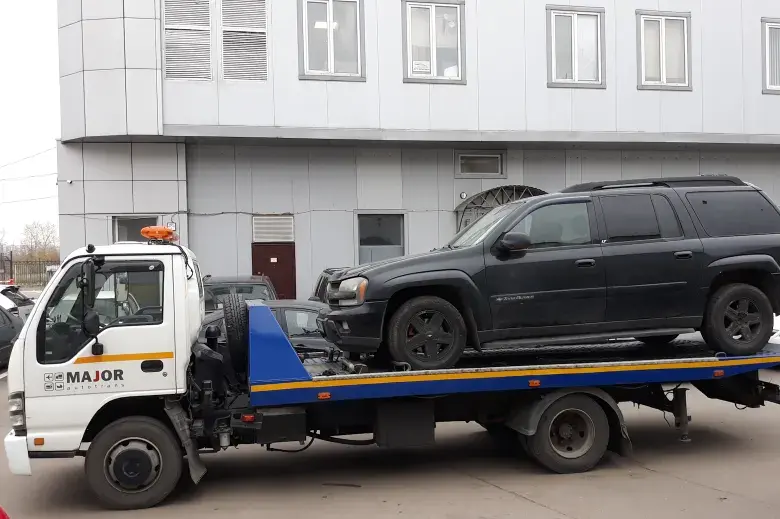 Эвакуатор с прицепом