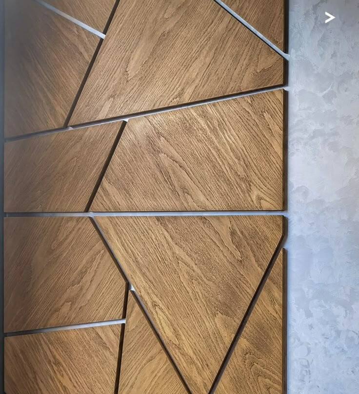 Близкий план текстуры панели из МДФ, отделанной шпоном орех; натуральный вид.*