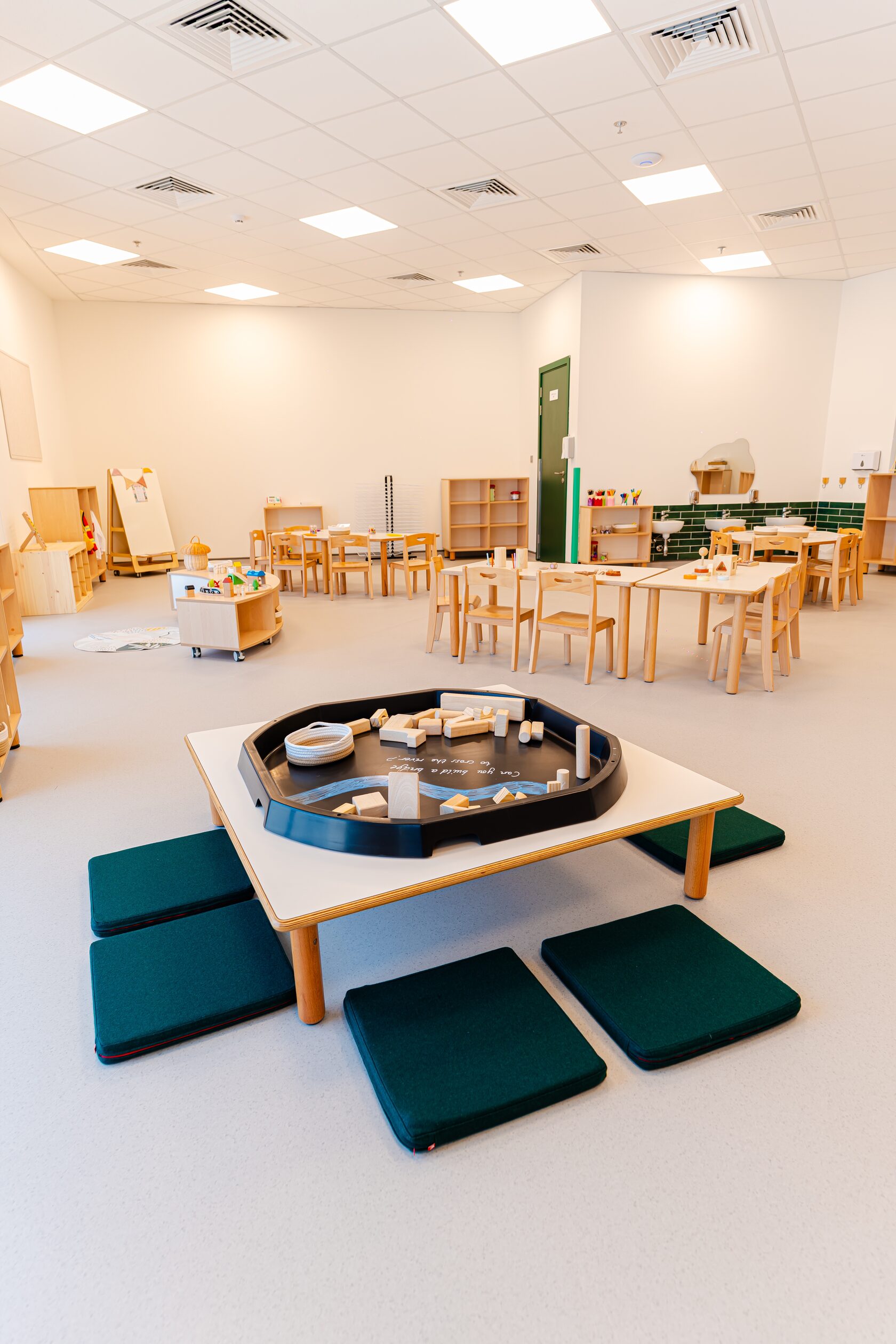 Children engaged in play-based learning at Paddington Park British nursery