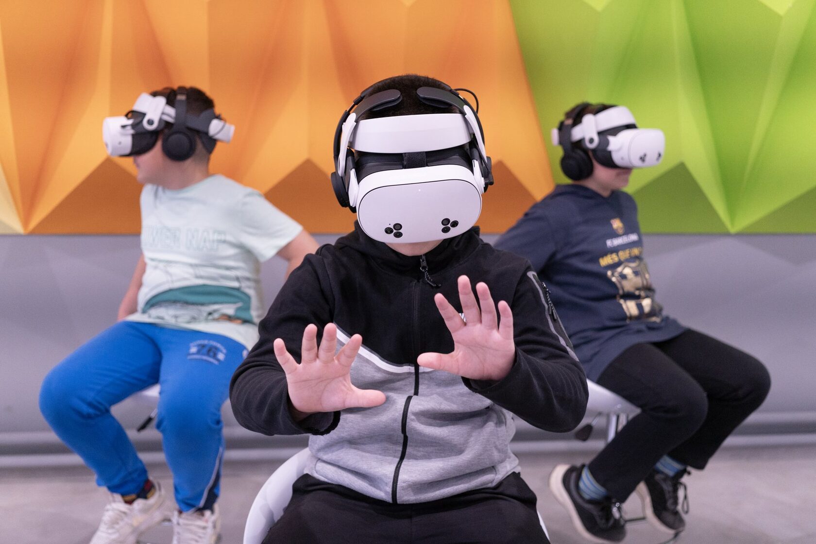 Audience seated in a synchronized six-seat VR theatre setup