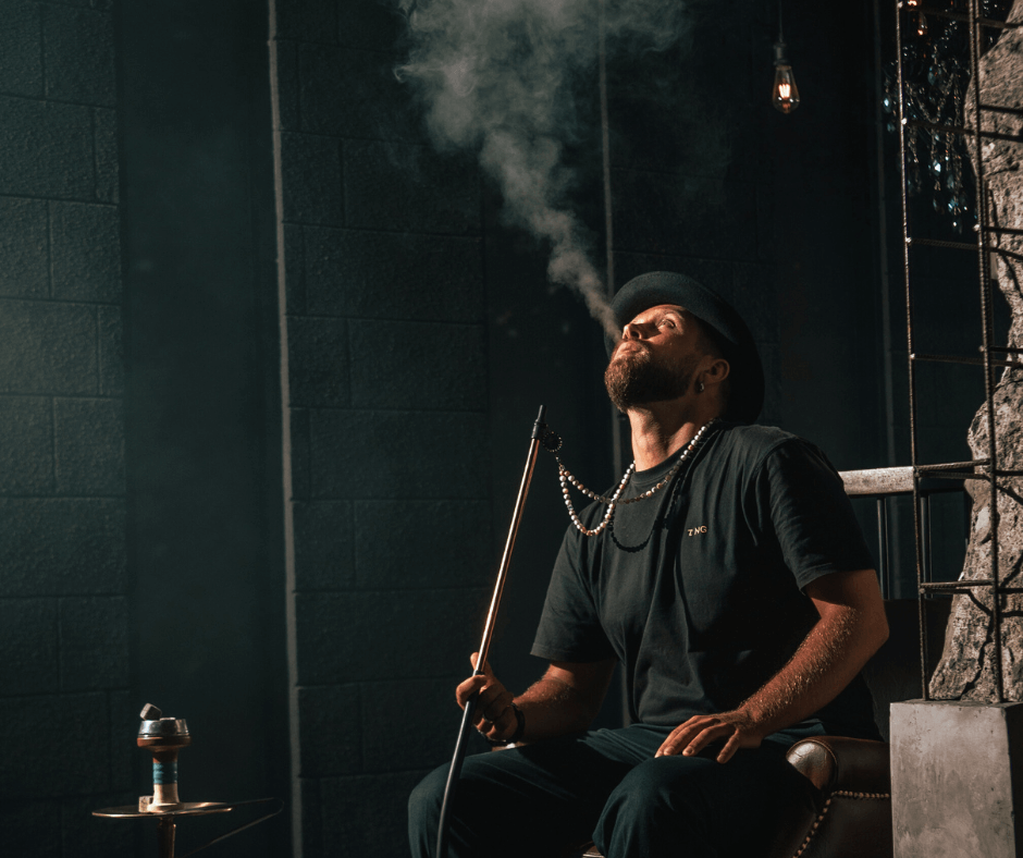 Hookah beside a man with black suits