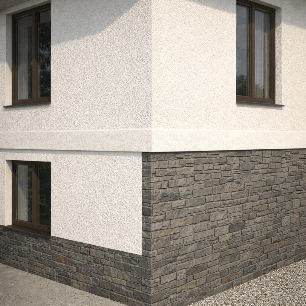 Комбинированный фасад частного дома. Верхняя часть выполнена штукатуркой, нижняя зона цоколя облицована камнем, показано разделение материалов по высоте.