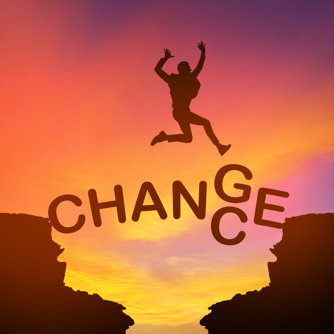 silhouette of a person jumping over a cliff with the word change in the background