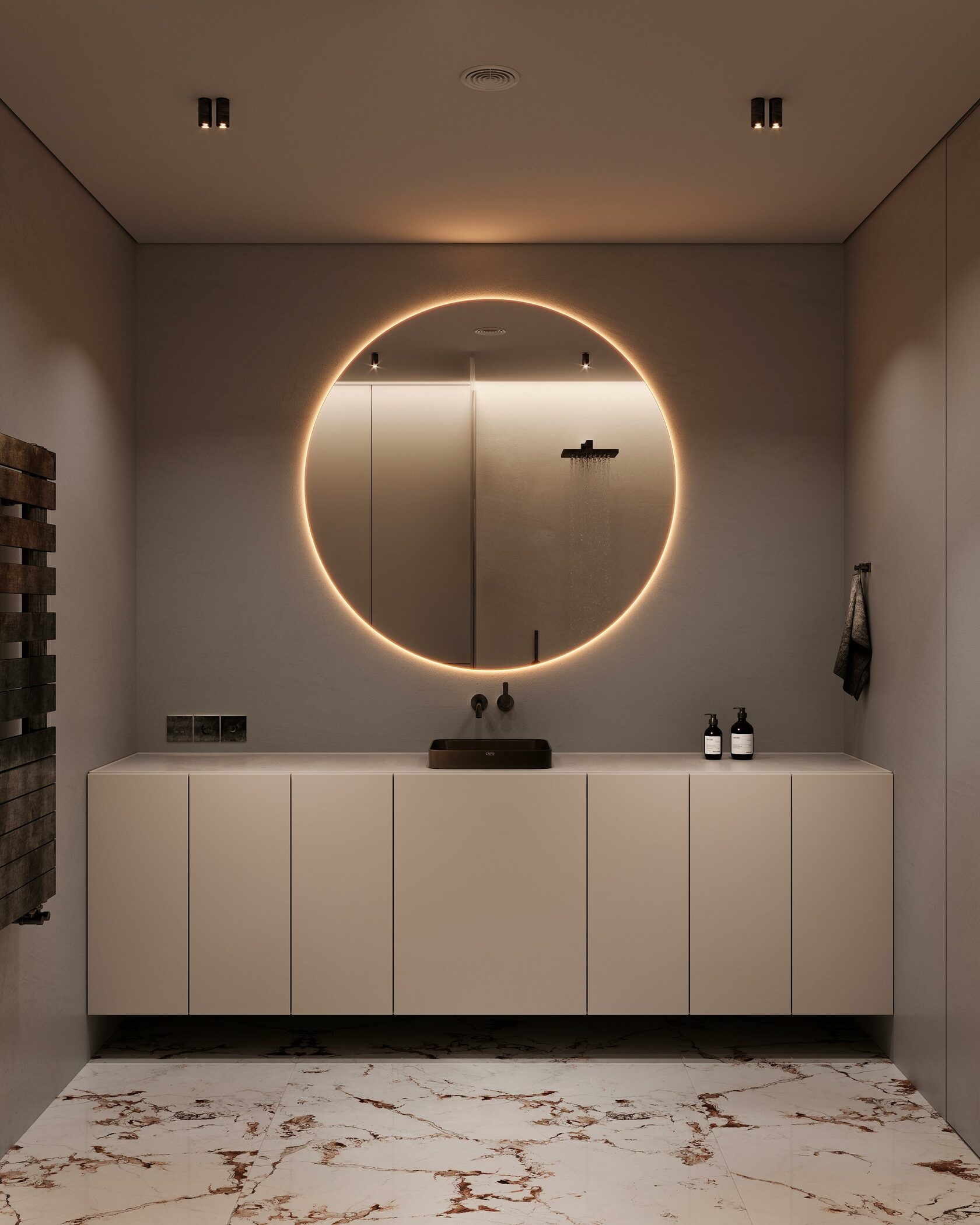bathroom with circle mirror and marble