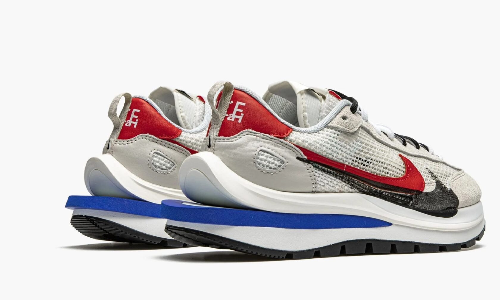 nike sacai waffle fuchsia