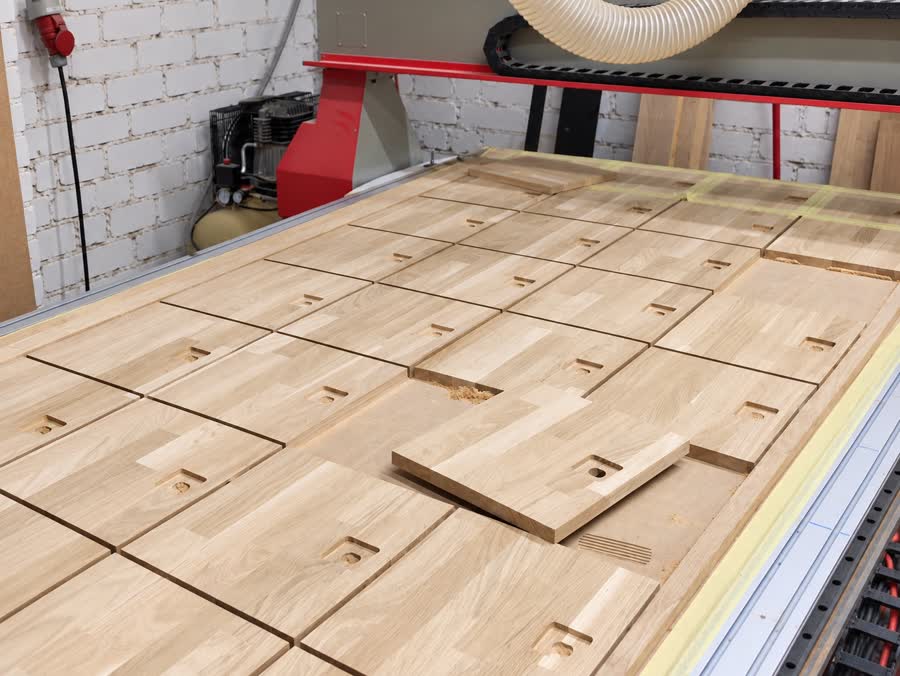 Solid oak panels on the CNC machine