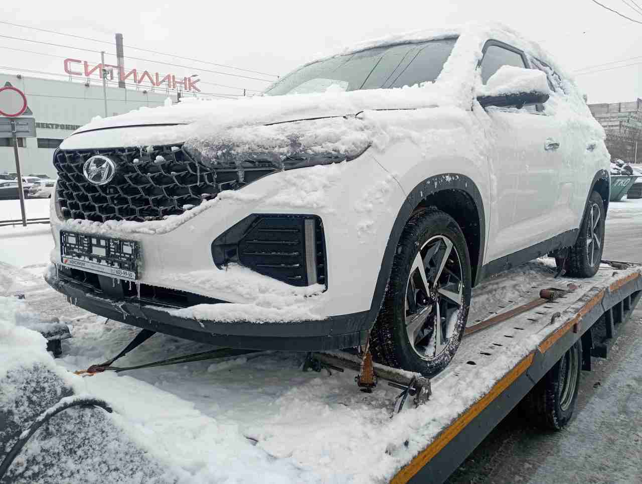 Эвакуация автомобиля Hyundai ix 35 с Торфяной дороги в Приморском районе Санкт-Петербурга