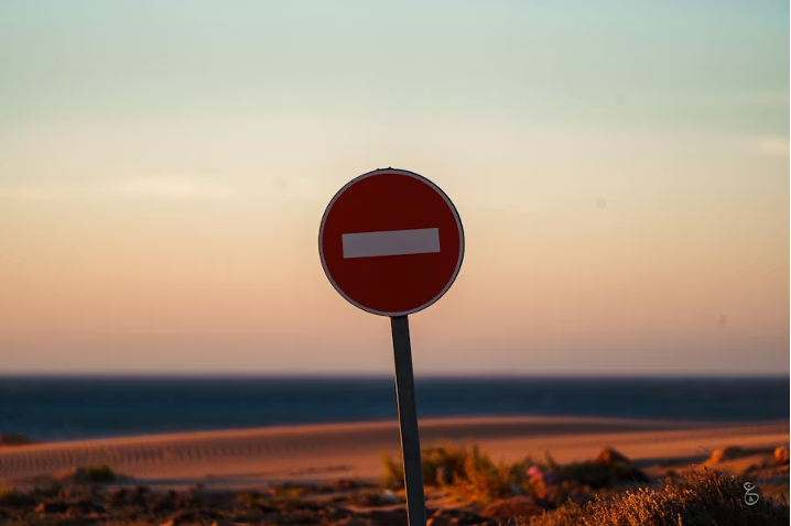 No-entry road sign symbolizing dating ad rejection and policy violations