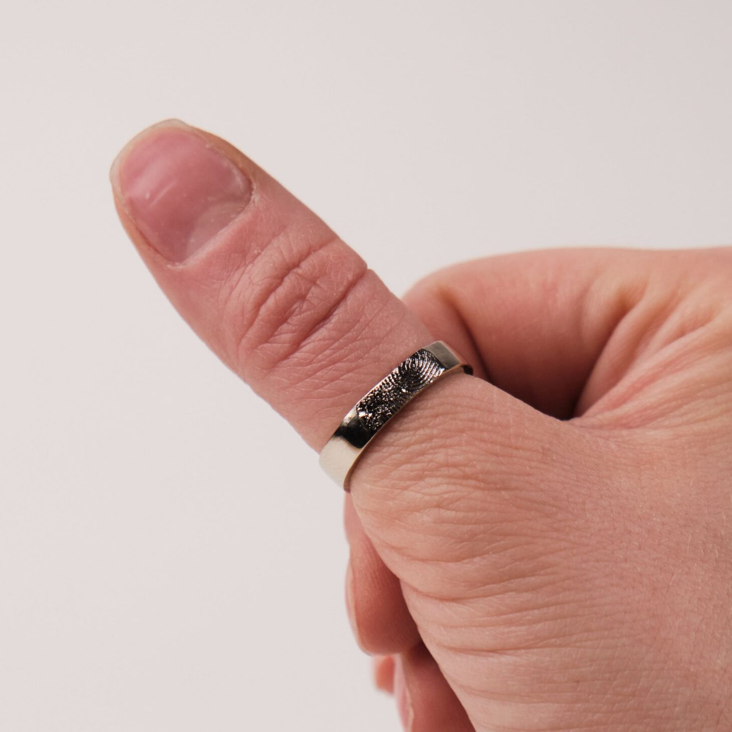 Кольцо с отпечатком пальца