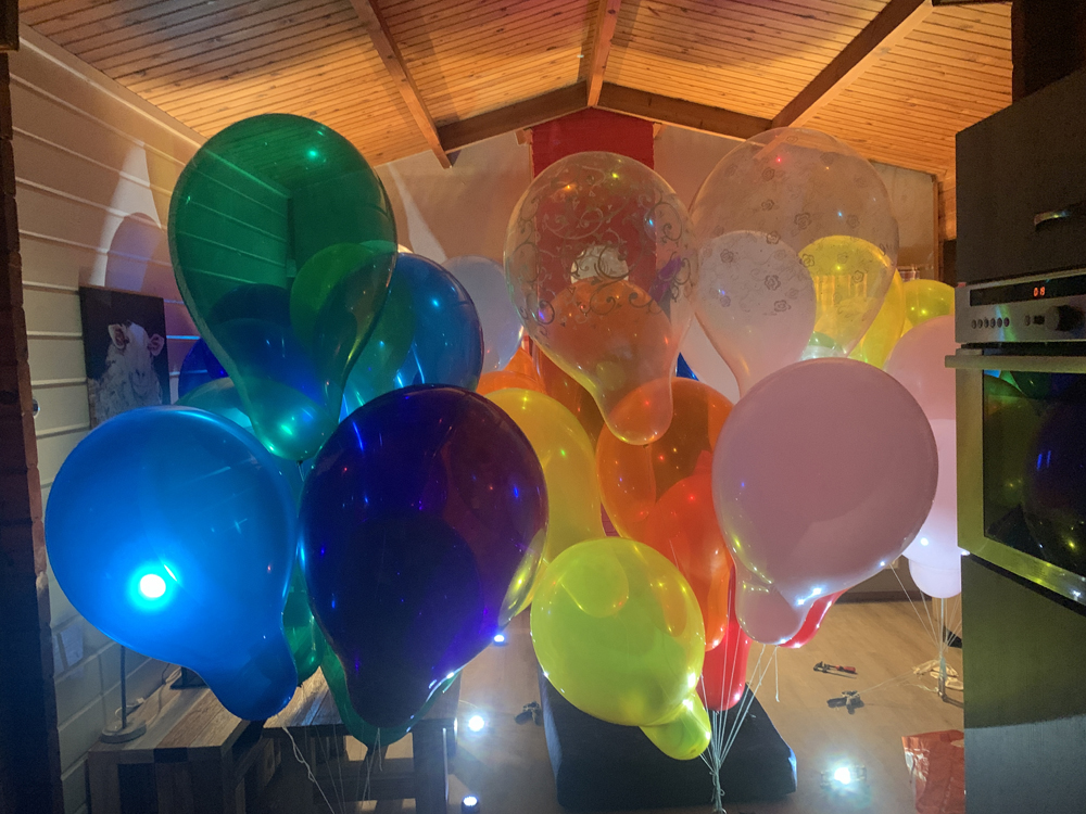 Big set of balloons are demonstrated in this webcam show