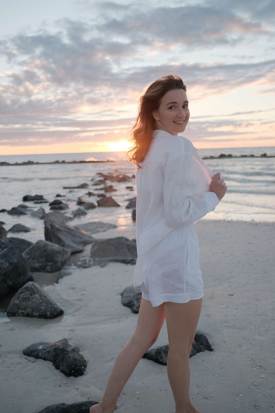 Maria at the beach at sunset
