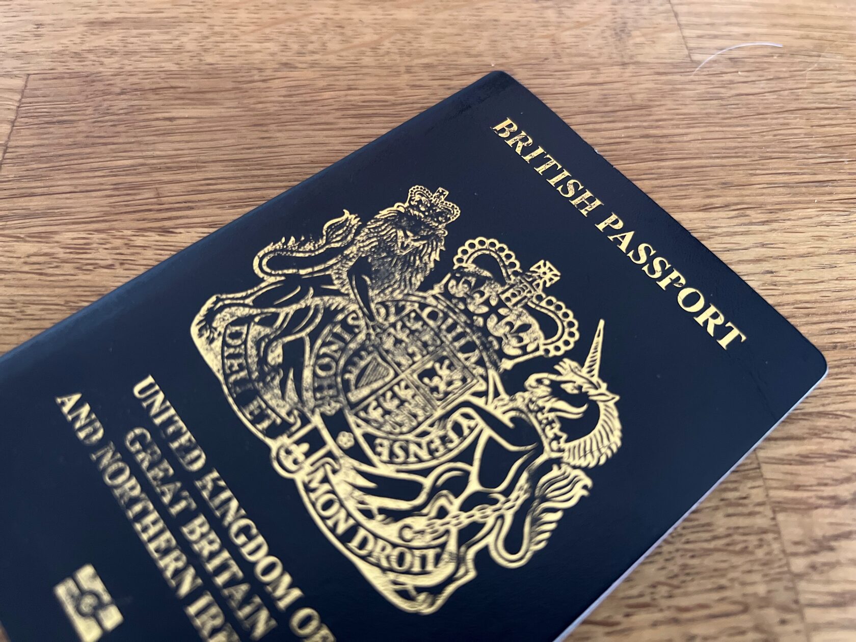 an image of a british passport on a table