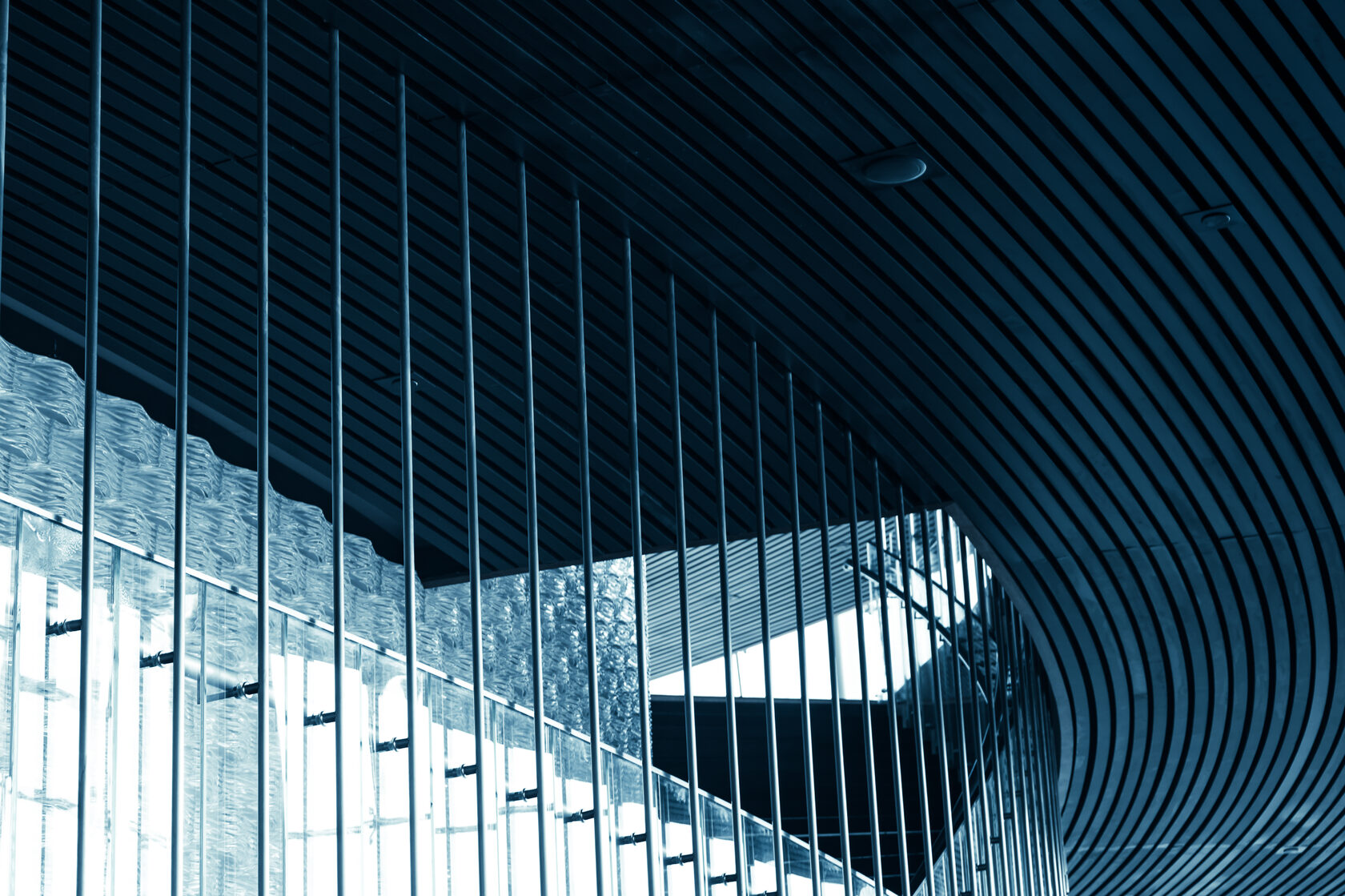 Modern architectural interior with vertical steel lines