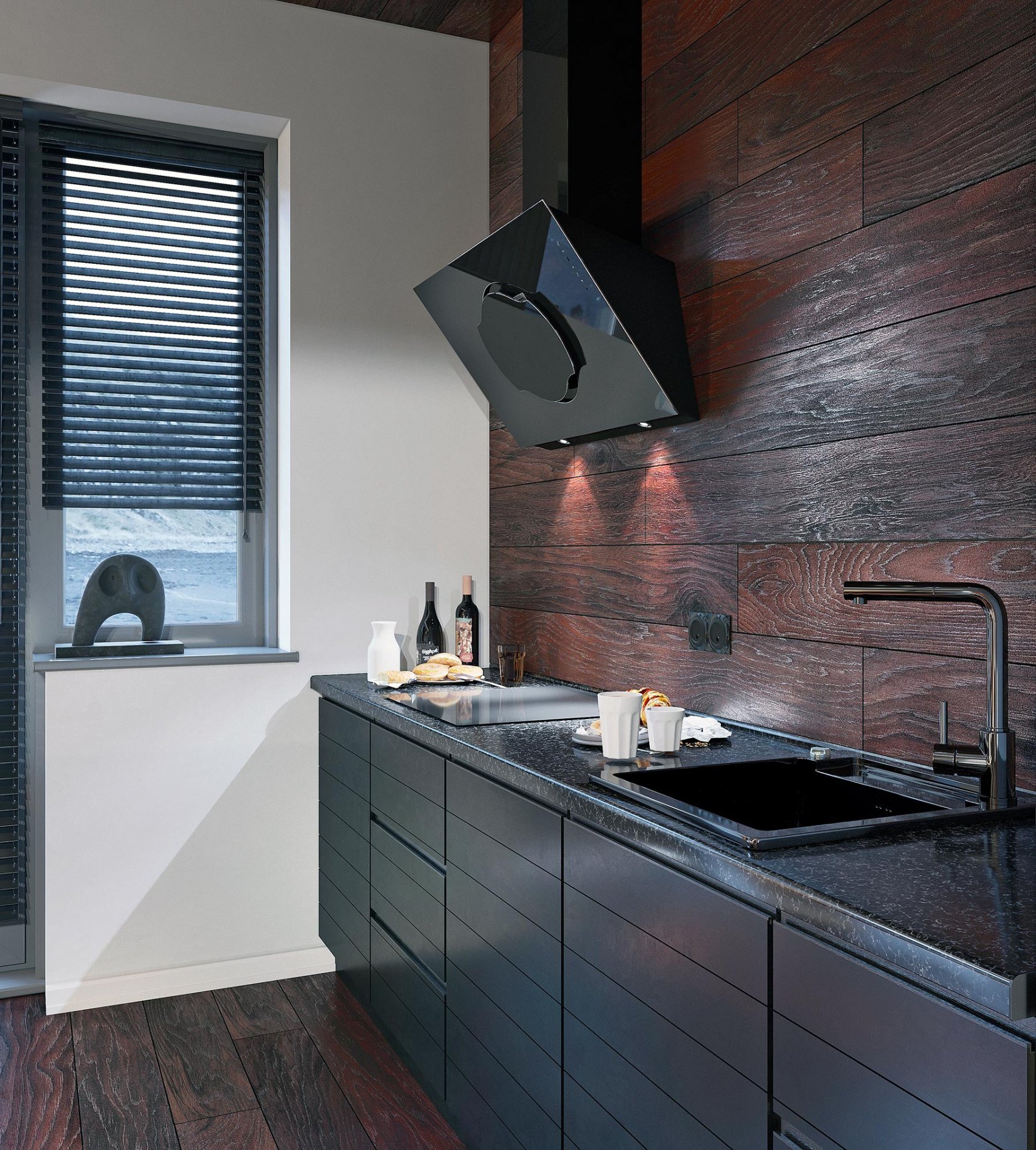 Cuisine noire sans meubles hauts, parfaite pour aménager un petit appartement avec légèreté
