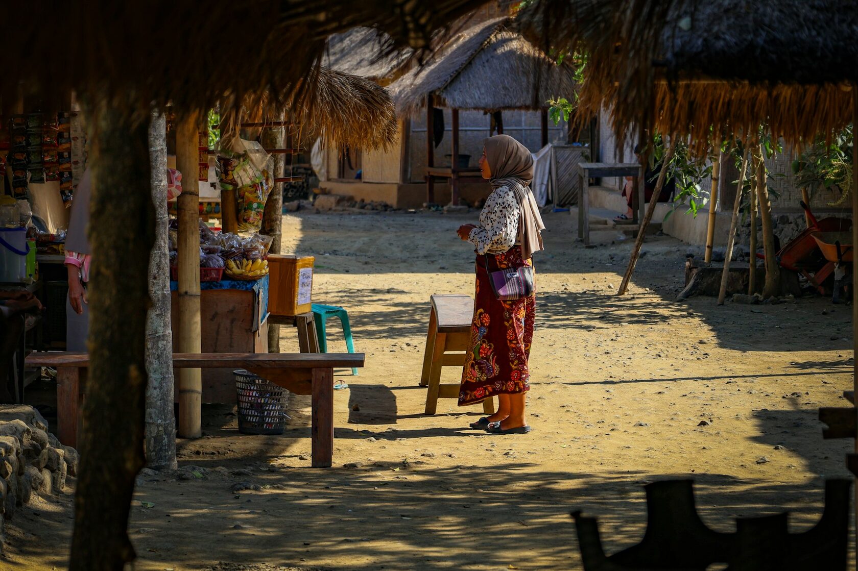 An elderly Cambodian woman resting in a rural village