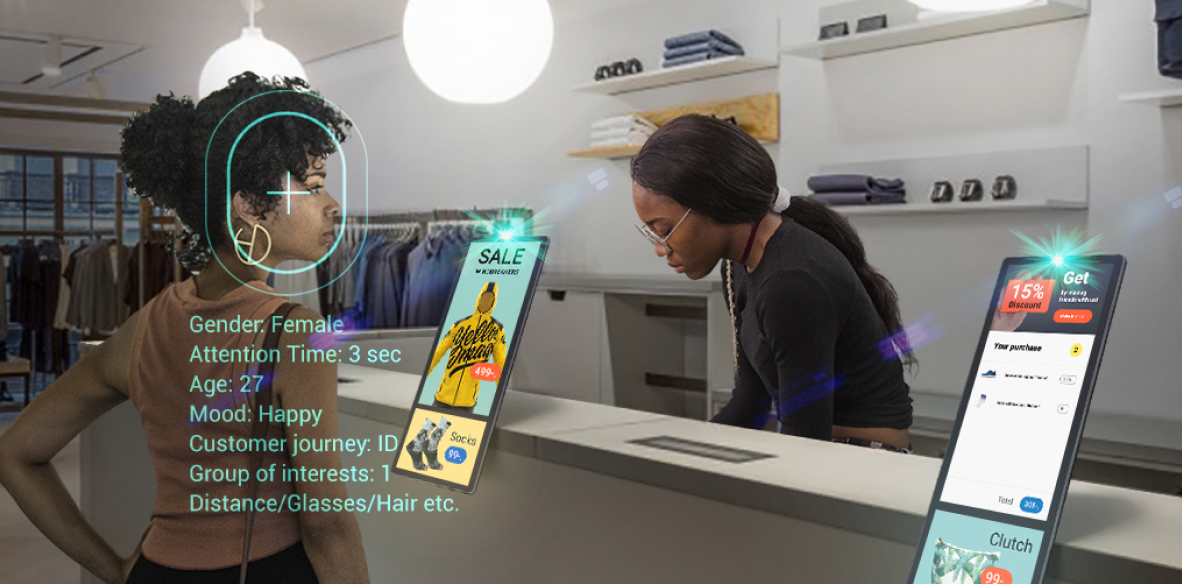 A woman buys things in a store and her data is read by a video camera with analytics