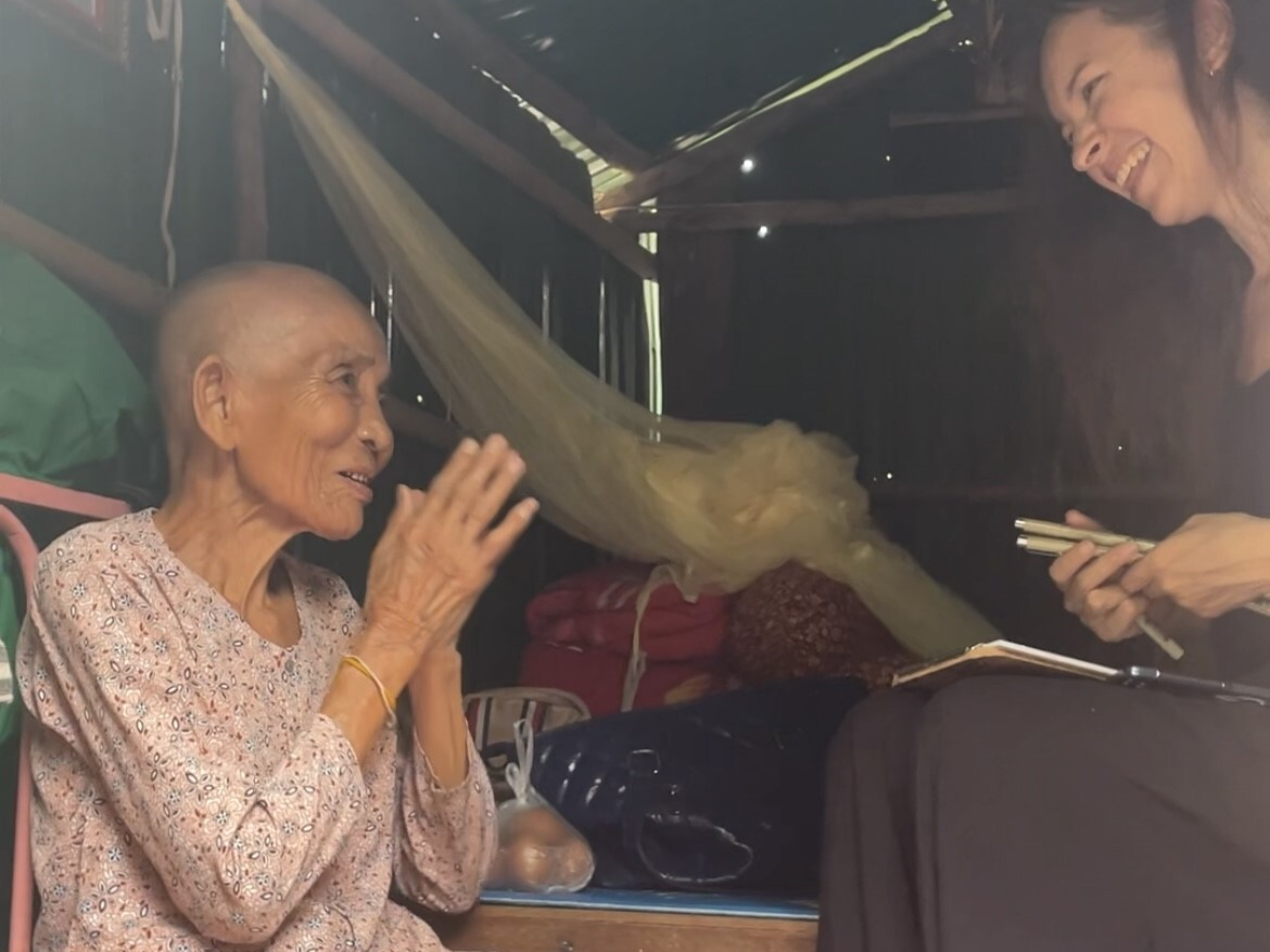 Charity team carrying out field work with local elders