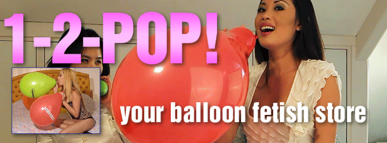 Girl popping balloon