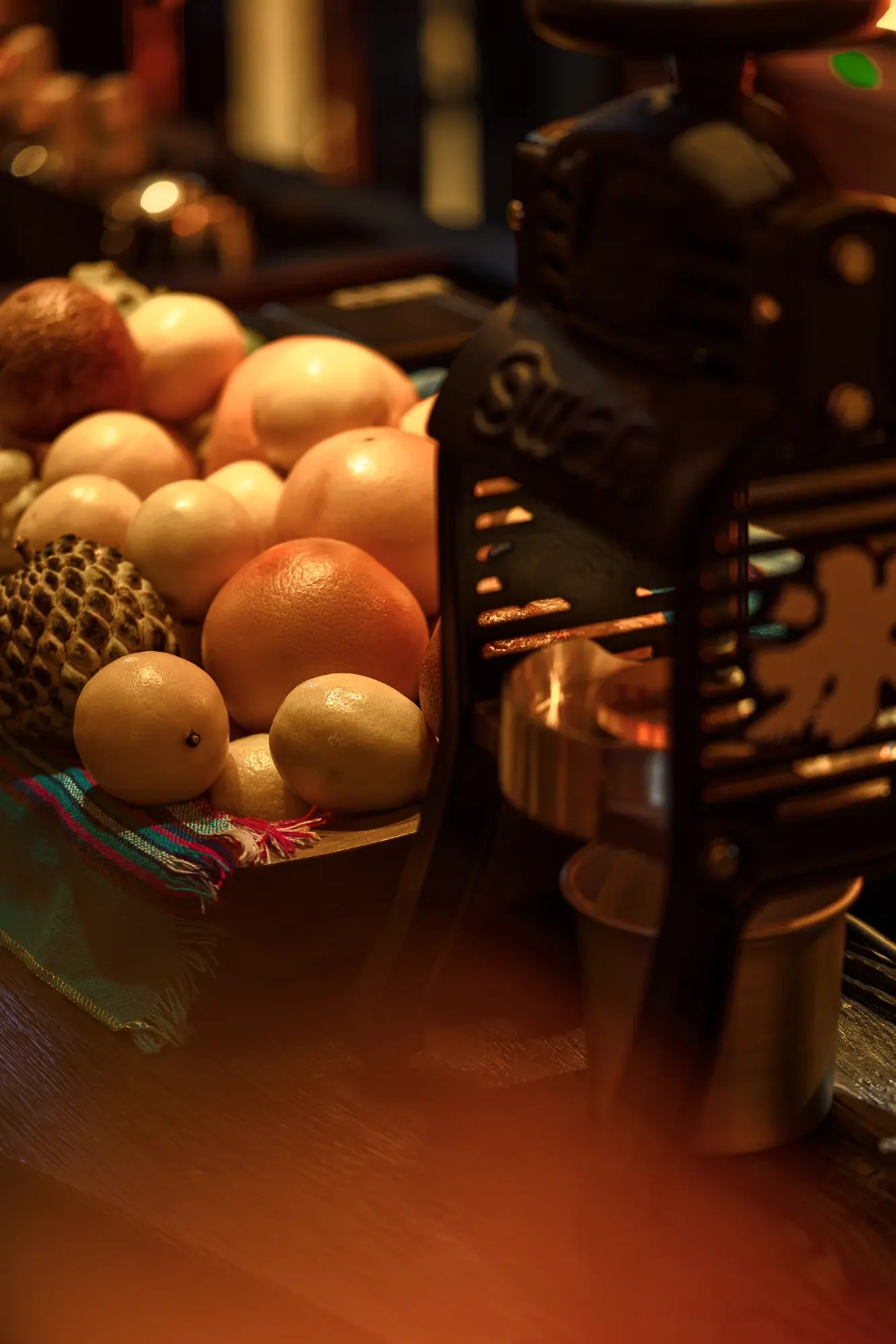 Fresh citrus and warm light at the Sobremesa bar