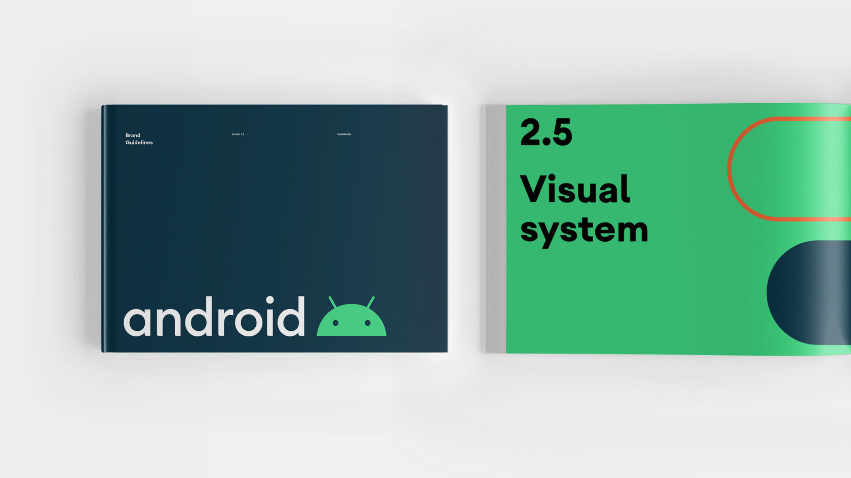 Новый логотипа и маскот на обложке руководства по фирменному стиля Android.