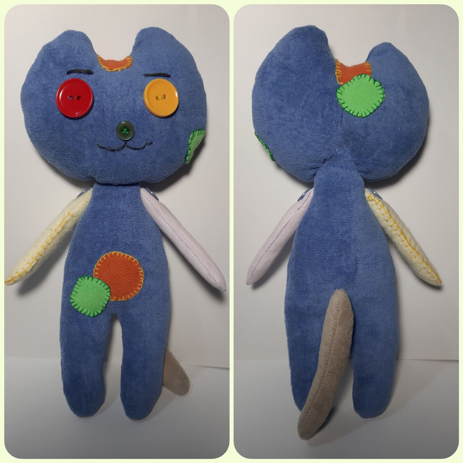 A child's handmade blue Mormitten toy