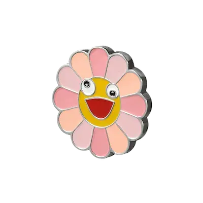 металлический значок в форме цветка