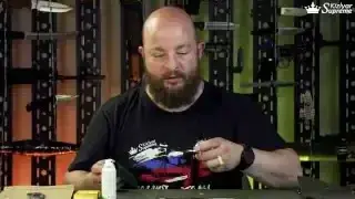 Cleaning a knife blade with oil and cloth