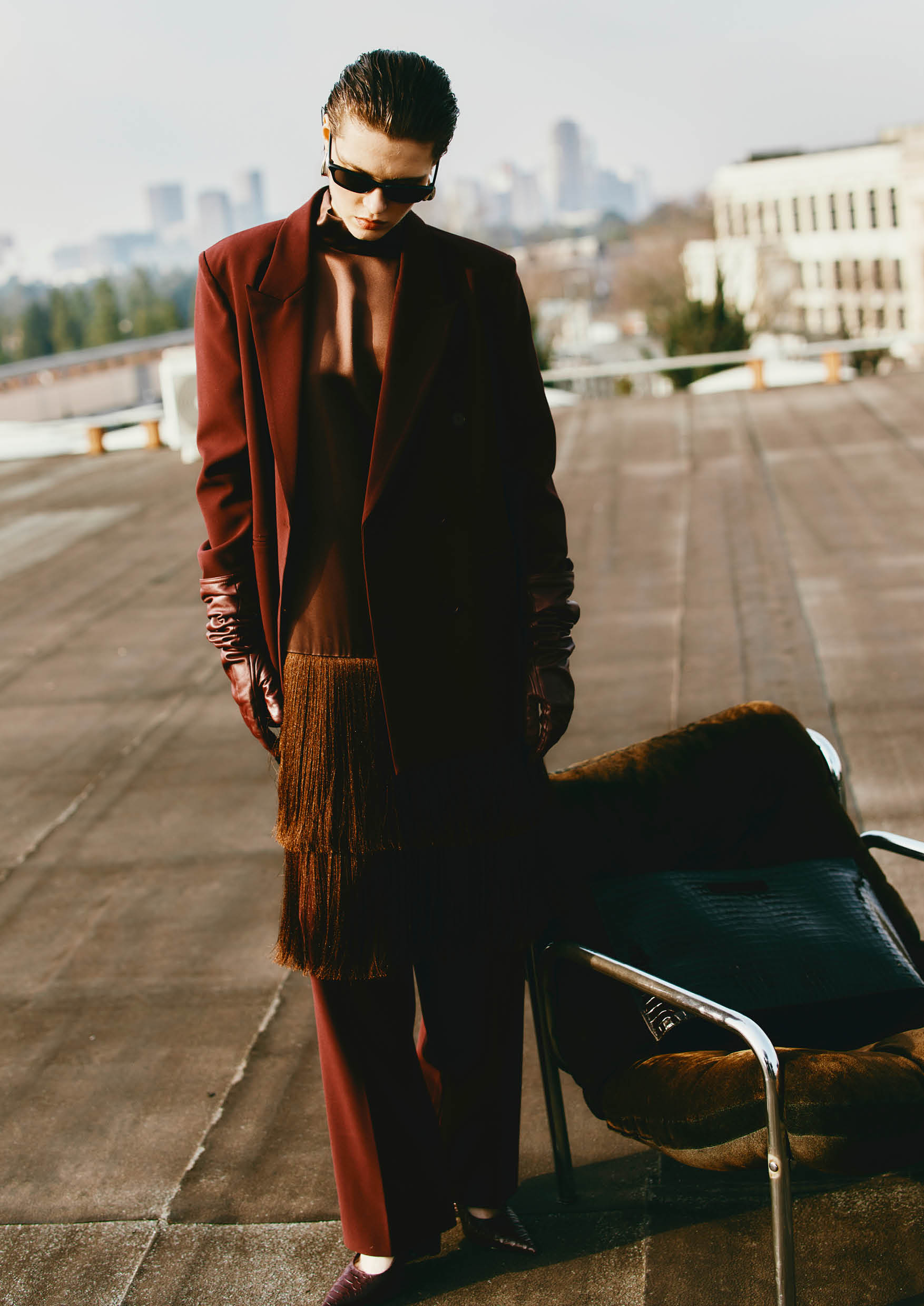 Isabelle Blanche Paris Autumn-Winter 2026/27: burgundy trouser suit with oversized jacket, fringed top and leather gloves