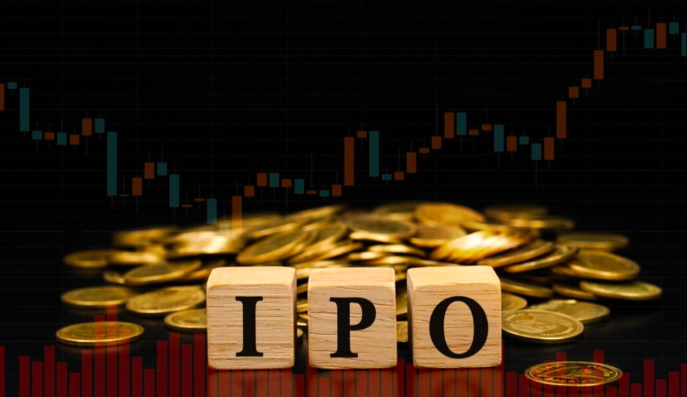 ICO vs IPO: Wooden blocks with the letters IPO in front of a mountain of coins and a background of candlestick graphics.