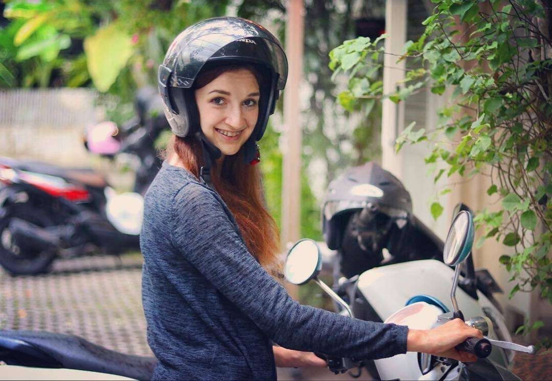 Maria on a scooter in Bali