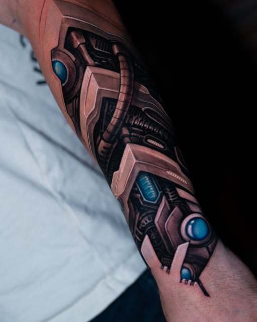 blog, Color biomechanical forearm tattoo with metallic panels and blue mechanical details by Rinat Tattarin, 515