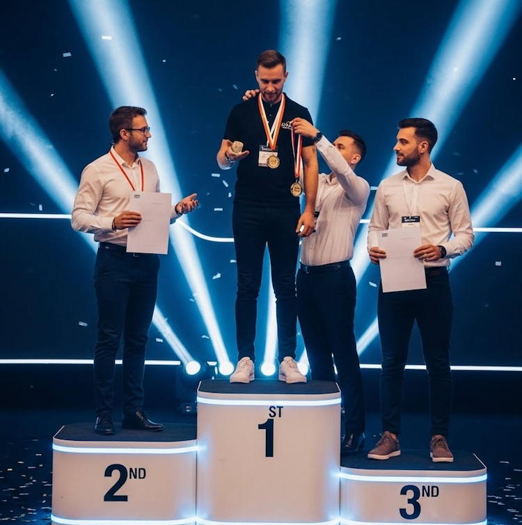 Award ceremony with a man being awarded first place