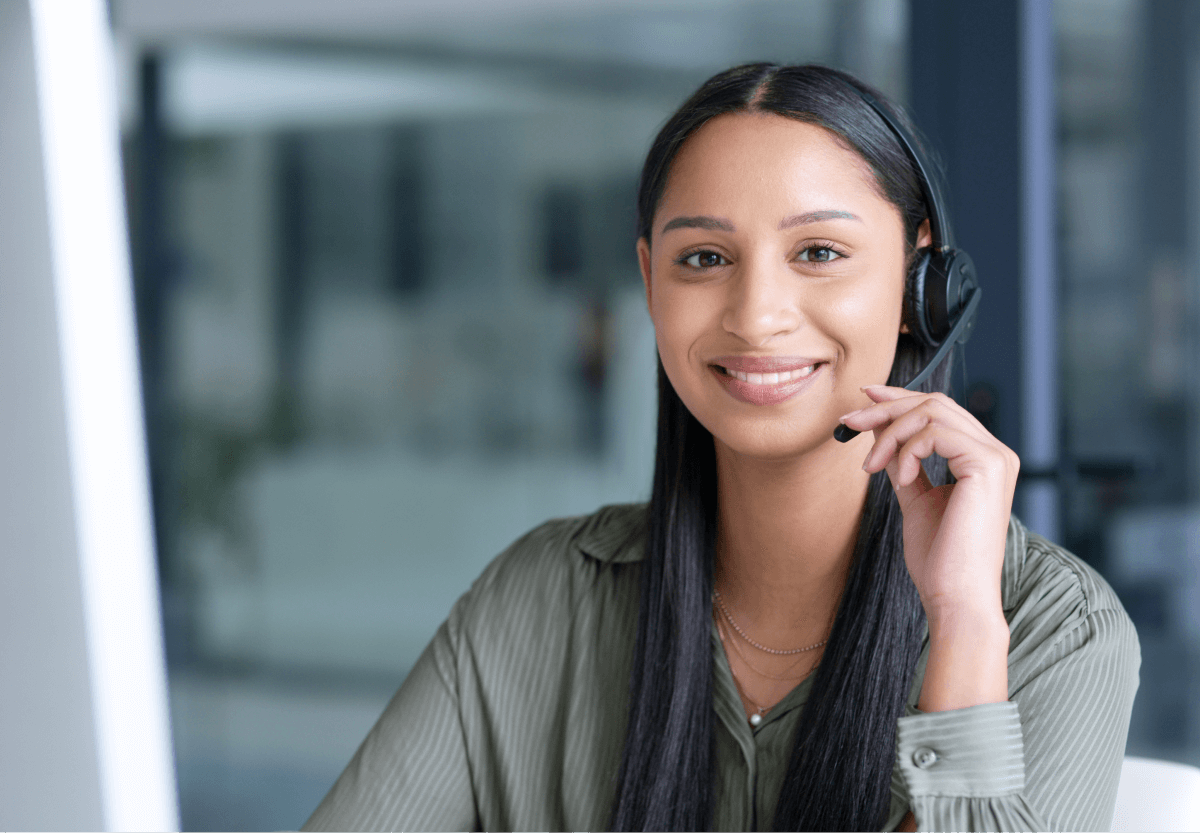 Happy, sales representative and portrait of a woman with a headset for online sales, support or telemarketing. Her English is perfect for business communication.