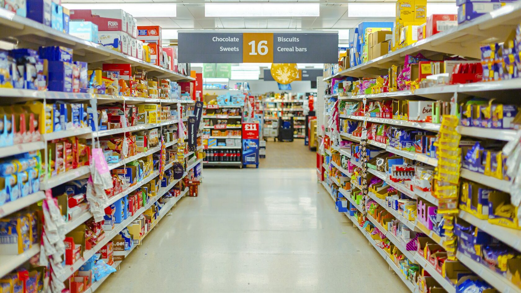 A grocery aisle stocked with food