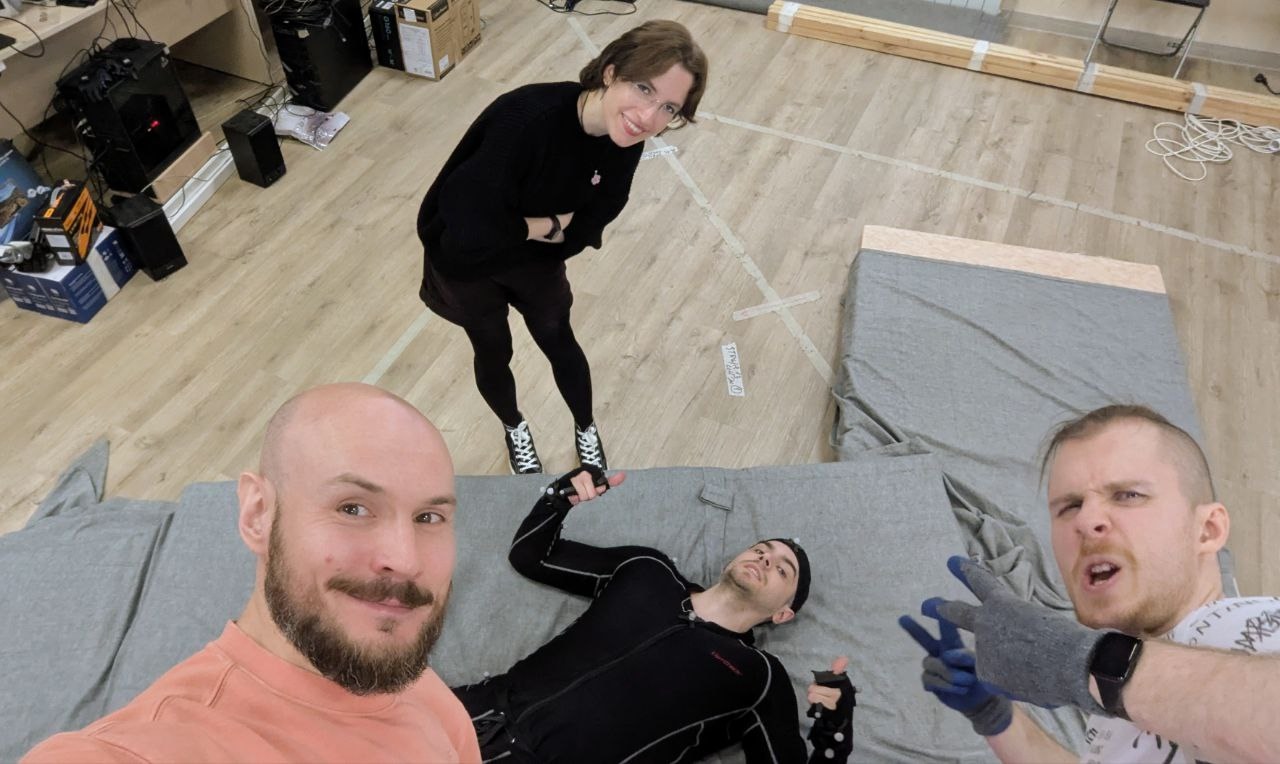 Фотография разработчиков Войны Миров Сибирь на мокап студии
