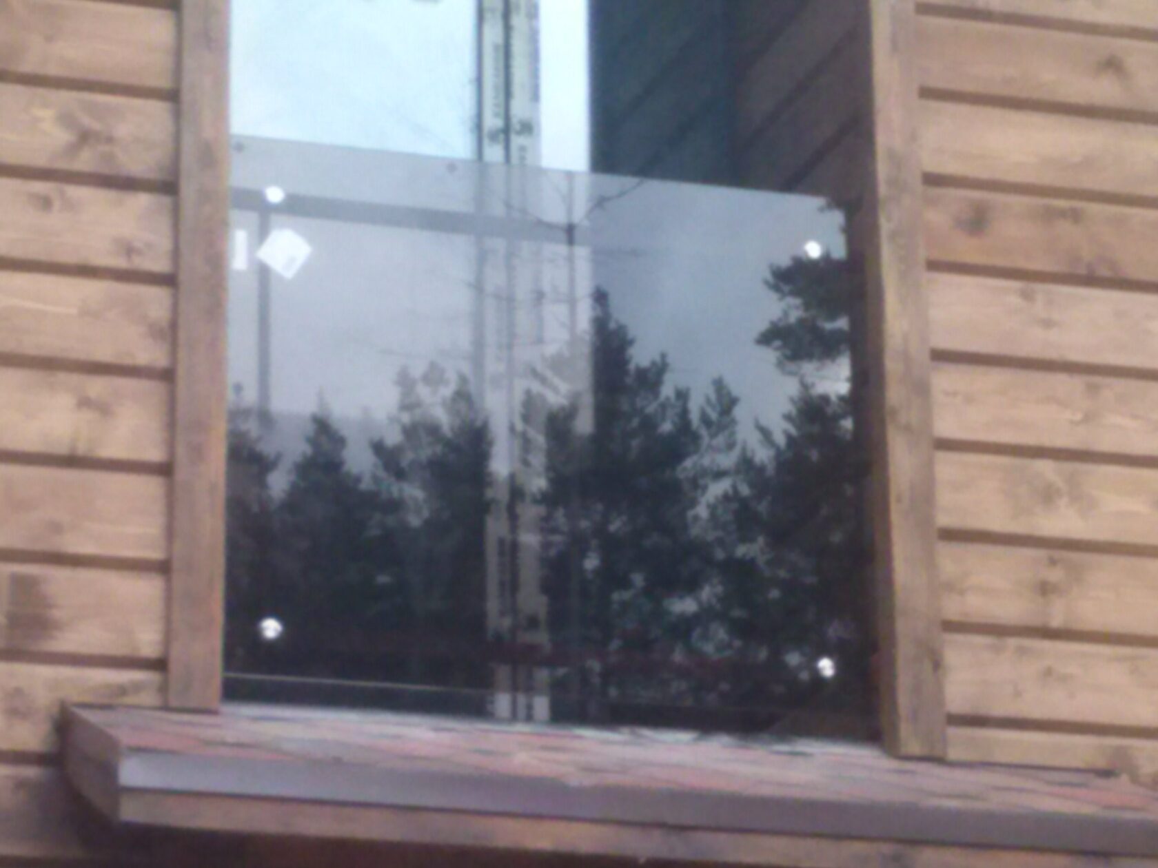 Стеклянные ограждения окон