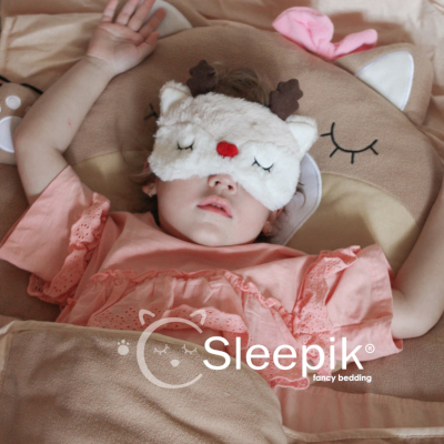 Sleepik mother and baby relaxing with sleep kit