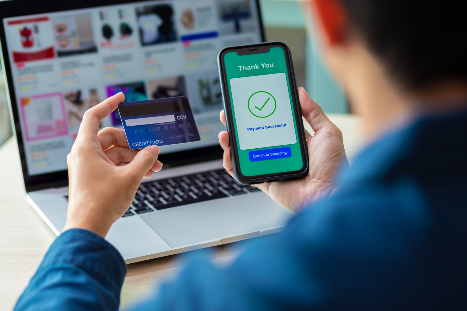 A person making an online payment with a credit card receives a token on their mobile phone.