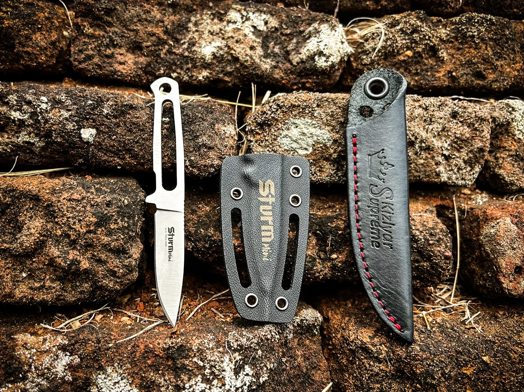 Kizlyar Supreme Sturm Mini compact fixed blade and fitted sheath in a forest