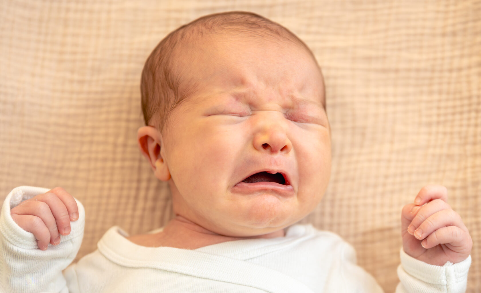 Infant in distress, as detected by baby cry analyzer