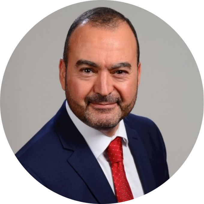 Dr. Hatem Goucha is an executive coach specializing in resilient teams, cultural awareness training, and 1-on-1 executive coaching.