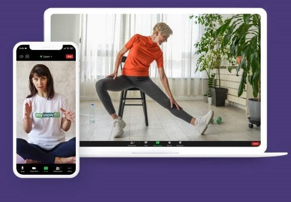 Woman doing knee rehab exercise on chair during online session