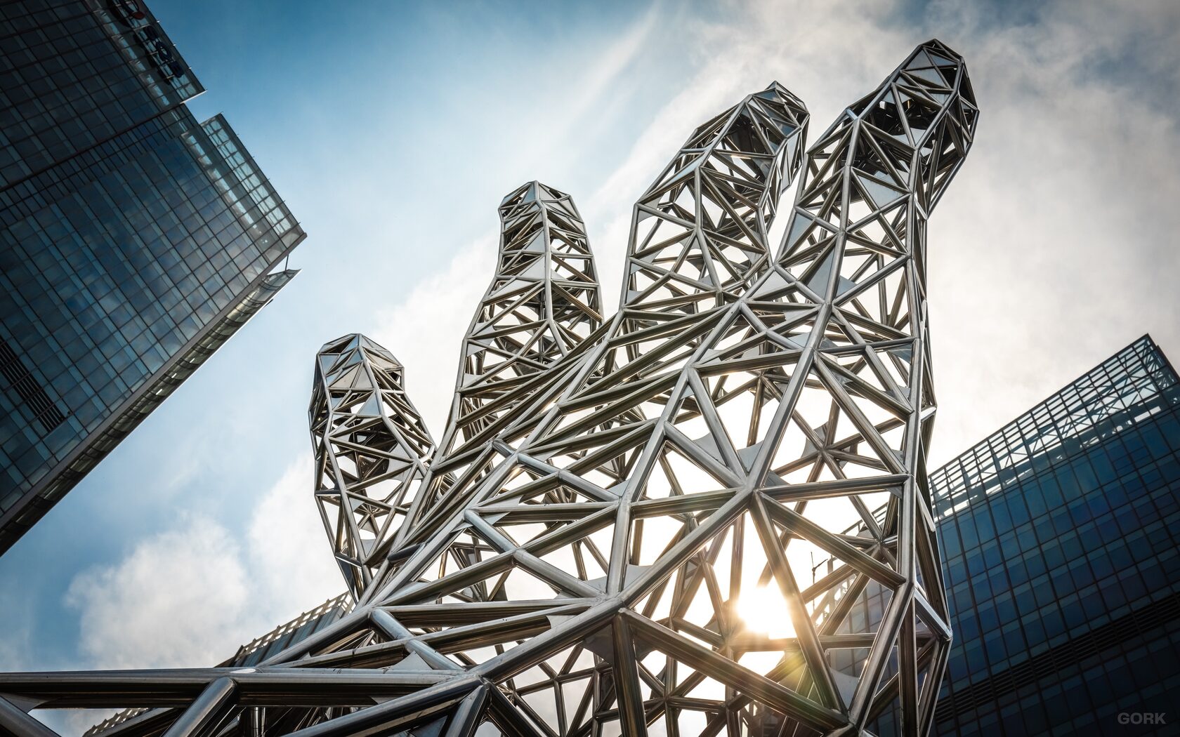 GORK A giant metal hand in a Tashkent business district surrounded by glass skyscrapers