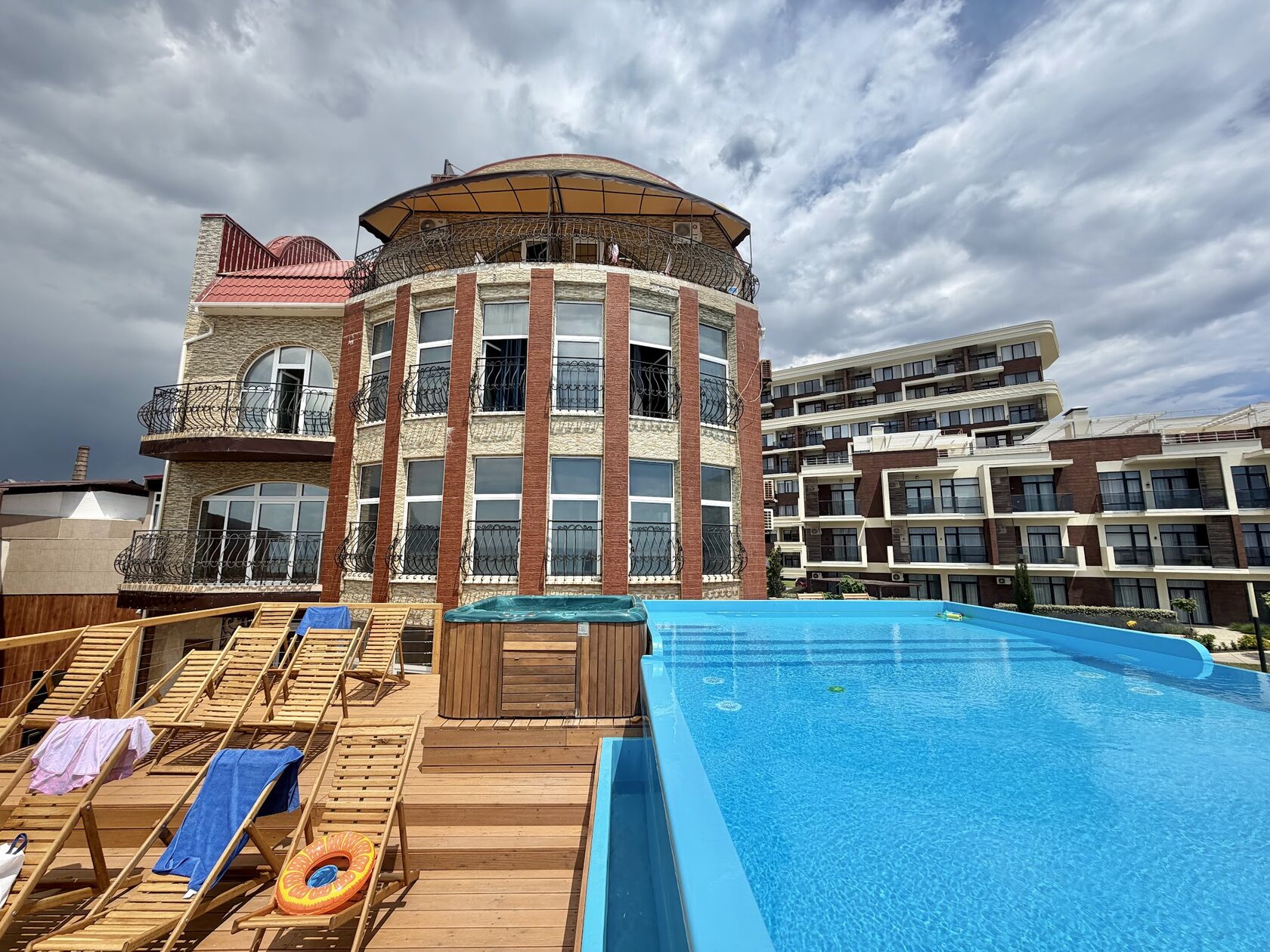 Resort building with sea view from pool deck