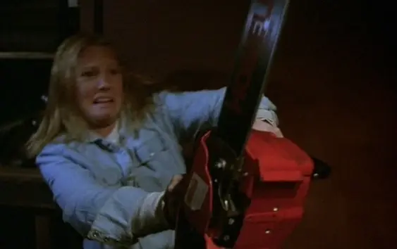 Кадр с пилой из фильма Пятница 13